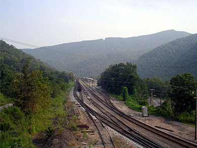 Railroad lines along a creek valley